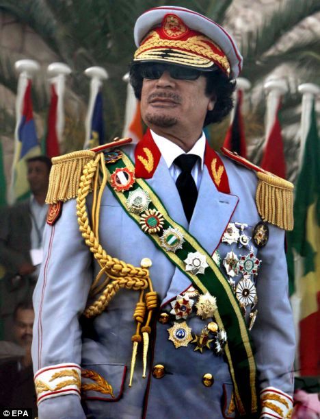 Shocking new video shows Gaddafi&#39;s body &#39;being used by rebels as ghoulish ventriloquist&#39;s doll&#39; | Muammar gaddafi, African royalty, Military uniform